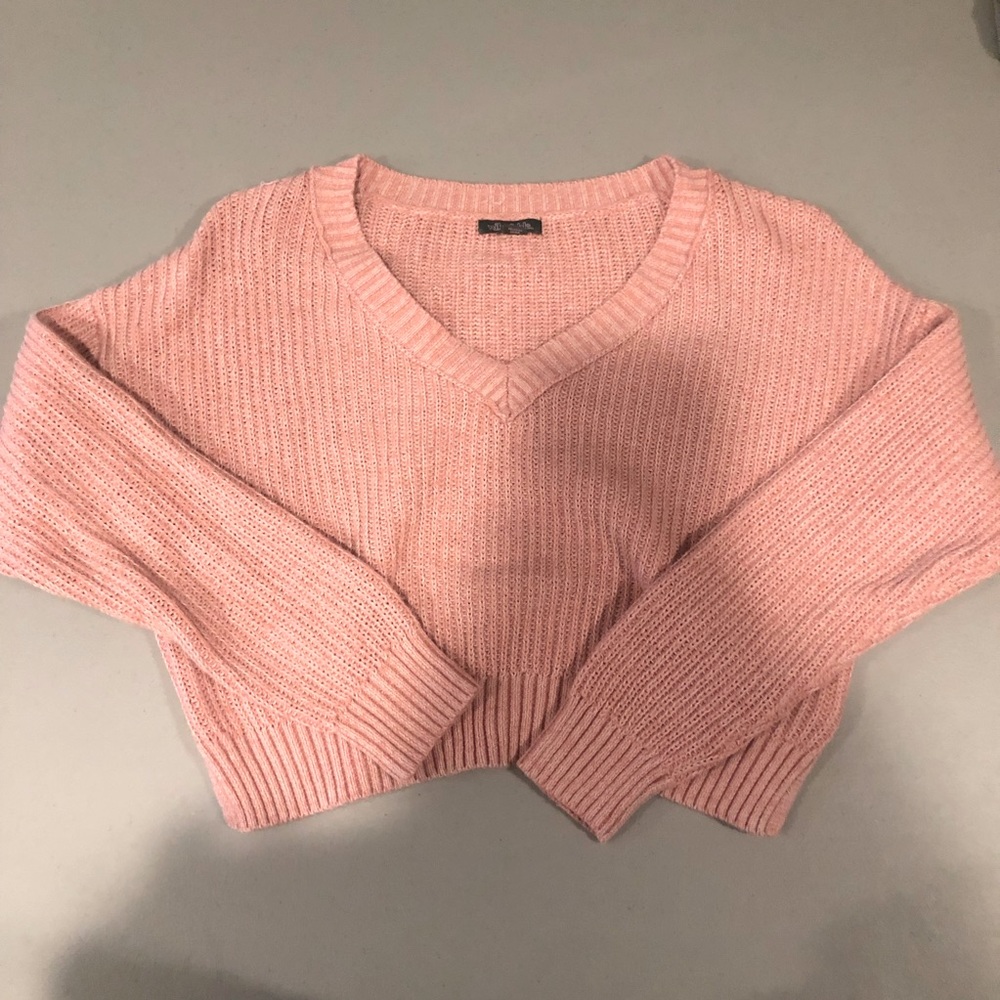 cropped pink knit sweater